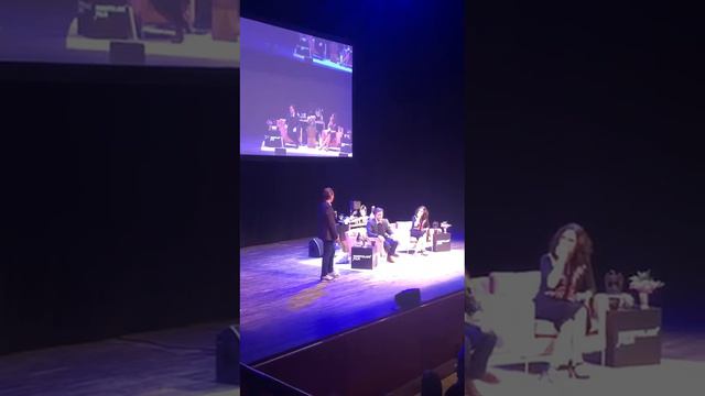 Daniel Neiditch on stage With Stephen Colbert and Julia Louis-Dreyfus at a Charity Event .