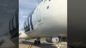 Буксировка самолёта, национальный аэропорт Минск.