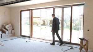 Обзор пластиковых раздвижных дверей в коттедже от Окна Проект