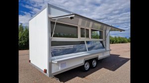 Торговый прицеп автолавка фудтрак  с холодильными витринами