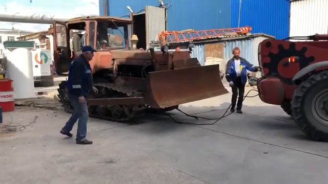 Заводим трактор дт-75 с толкача смотреть онлайн