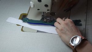 Обработка застёжки брюк