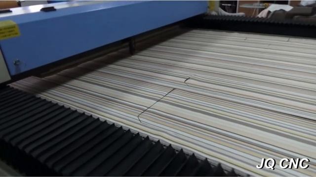 JQ1630 automatic fabric laser cutting machine for sofa garments.mp4