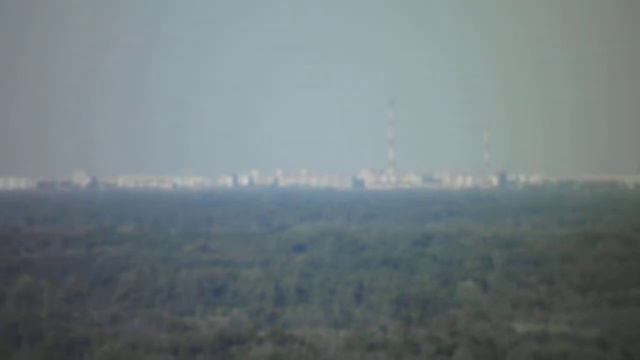 Снимаю город Волжский с Ергенинской возвышенности из Кировского района Волгограда с увеличением смотреть онлайн