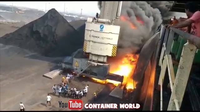 HUGE FIRE - Crane operator jumps off Gottwald Harbour Crane
