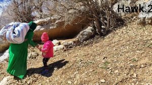 Under the Big Rock: Mother and Child Struggle for Safety Cameraman's Support