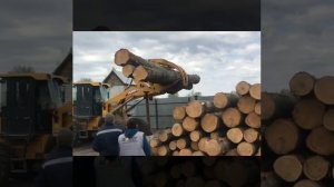 Выгрузка леса китайским погрузчиком в Новосибирске