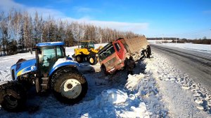 Опасная и неудачная эвакуация тяжелого самосвала!