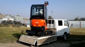 Мини-экскаватор Kubota KX019-4 разгрузка с фуры