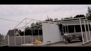 Строим гараж 5,5*7 с навесом . Своими руками.  Обшиваем профлистом.