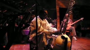 Toumani Diabate talking about hisband and playing the Kora