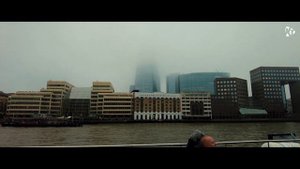 LONDON BRIDGE - A BOAT ON THE RIVER