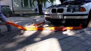 Буксировка БМВ с АКПП  на универсальной жесткой сцепке
