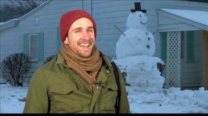 Driver tries to run over Kentucky snowman which had tree trunk has base