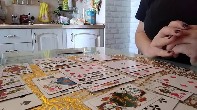 Расклад на червовую даму и бубнового короля.