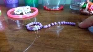 Колечко из бисера в форме бантика?