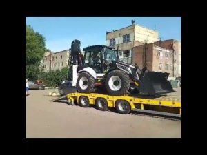 Экскаватор-погрузчик Hidromek. Съезд с 0,9 площадки