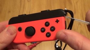 EASY FIX! How to remove a Stuck Joy-Con Wrist Strap when it is Upside Down / Wrong Way Round