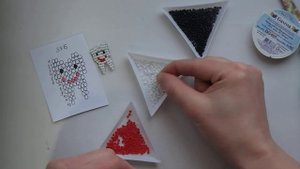 Зубик из бисера в технике параллельного плетения