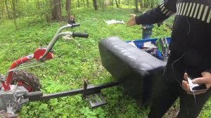 Мотоблок Мотор Сич дизельный 10 л.с. с прицепом в лесу