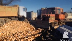 Планировка территории бульдозером ДТ-75