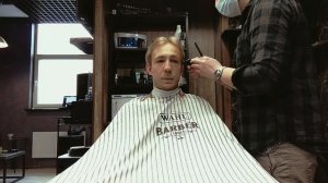 Mens haircut on scissors