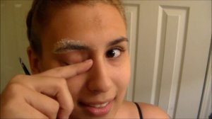 BLEACHING MY BLACK EYEBROWS BLONDE - warning I am crazy in this video