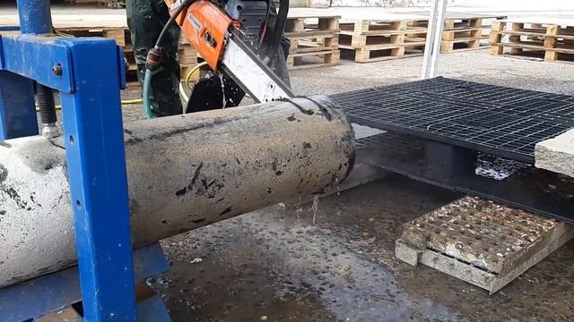 Coated Ductile Iron Pipe cutting with Husqvarna K970 gas power chainsaw смотреть онлайн