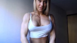 Fitness Webcam Girl flexing her biceps in camera