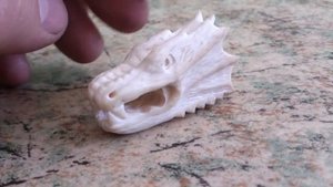 резба по кости,голова дракона