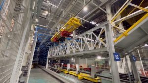 Укладка лонжеронов на устройство позиционирования автоматического склада лонжеронов