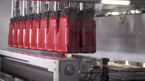 Упаковка канистр в картонный короб на OCME SCORPIUS