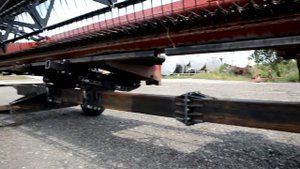 Тележка для транспортировки жатки.