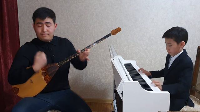 "Әлқисса " - Нұрғиса Тілендиев.Орындағандар ағайынды композиторлар Ғаламат және Нұрали Бейсеқожалар
