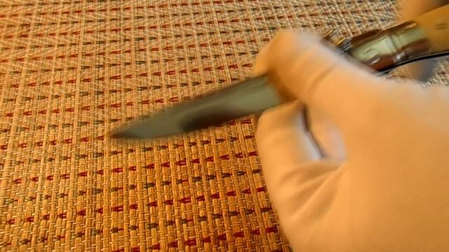 Складная финка НКВД (легендарная финка НКВД) с красной звездой.