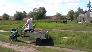 Мотоблок Caiman Vario работа с телегой..mp4