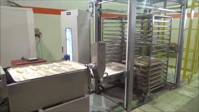 ENKOMAK Автоматический укладчик тестовых заготовок от делителя до противня в тележке