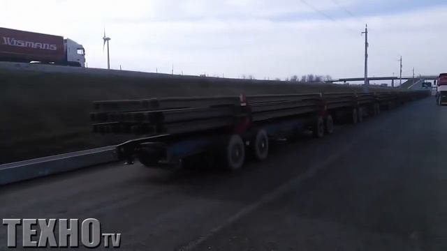 Вот так перевозят 100 метровые Железнодорожные рельсы смотреть онлайн