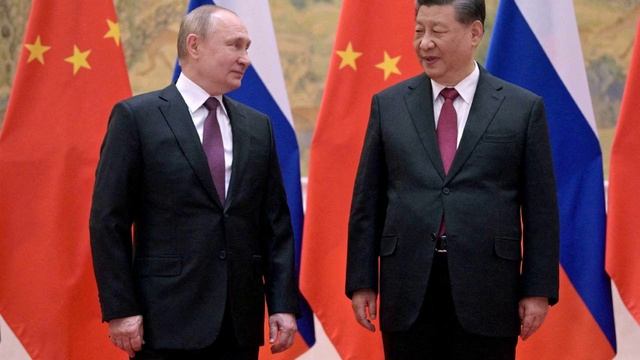 Путин поздравил Си Цзиньпина с переизбранием на пост генсека Компартии Китая