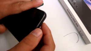 How to remove the SIM card from a Samsung Galaxy A54 5G, A53, A52s, A55