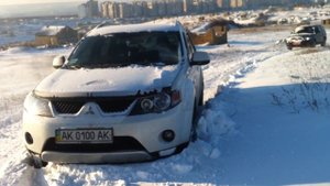 Mitsubishi Outlander XL 2,4 снег не берет...