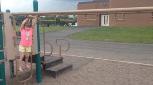 Ella on monkey bars