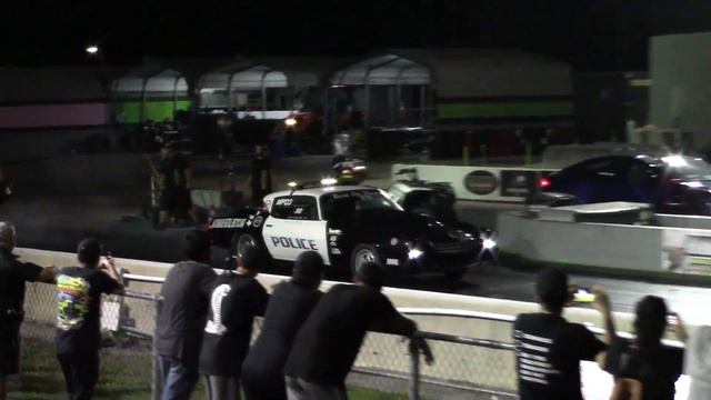 Tesla Plaid Model S Chasing Down Big Tire Camaro Police Car In The 1/4 Mile смотреть онлайн