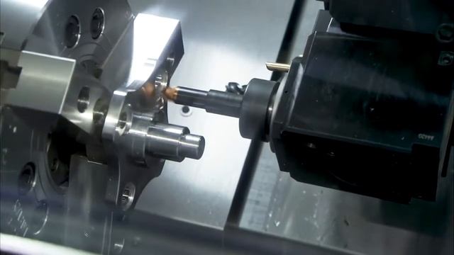 Горизонтальный токарный обрабатывающий центр Okuma GENOS L2000, L3000 смотреть онлайн