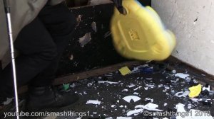 Smashing a Mickey Mouse Toy Thing