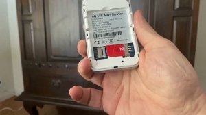 Inserting SIM card into MiFi