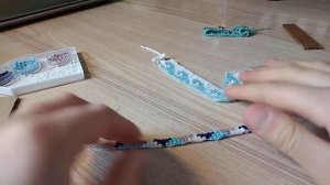 Как снимамать готовый браслет  из бисера со станка