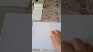 Держатель для туалетной бумаги из газетных трубочек.