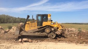 Бульдозе Caterpillar D6R планировка