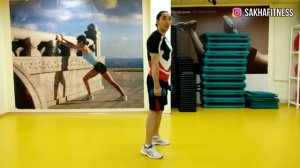 Приседания с подъёмами на носки с гантелями